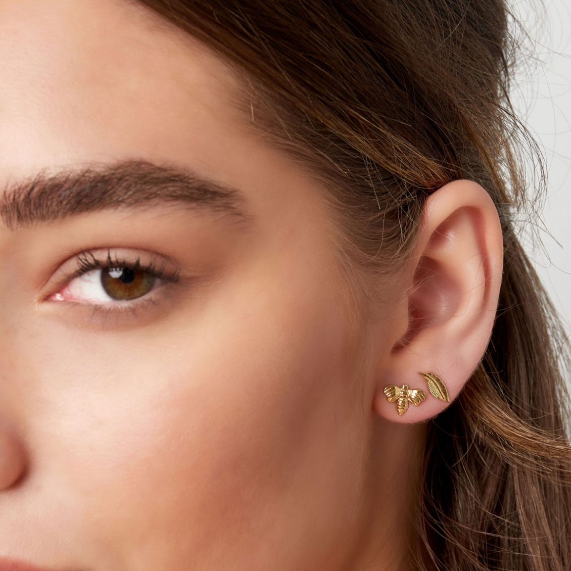 Oorknopjes met veertje | Goudkleurig