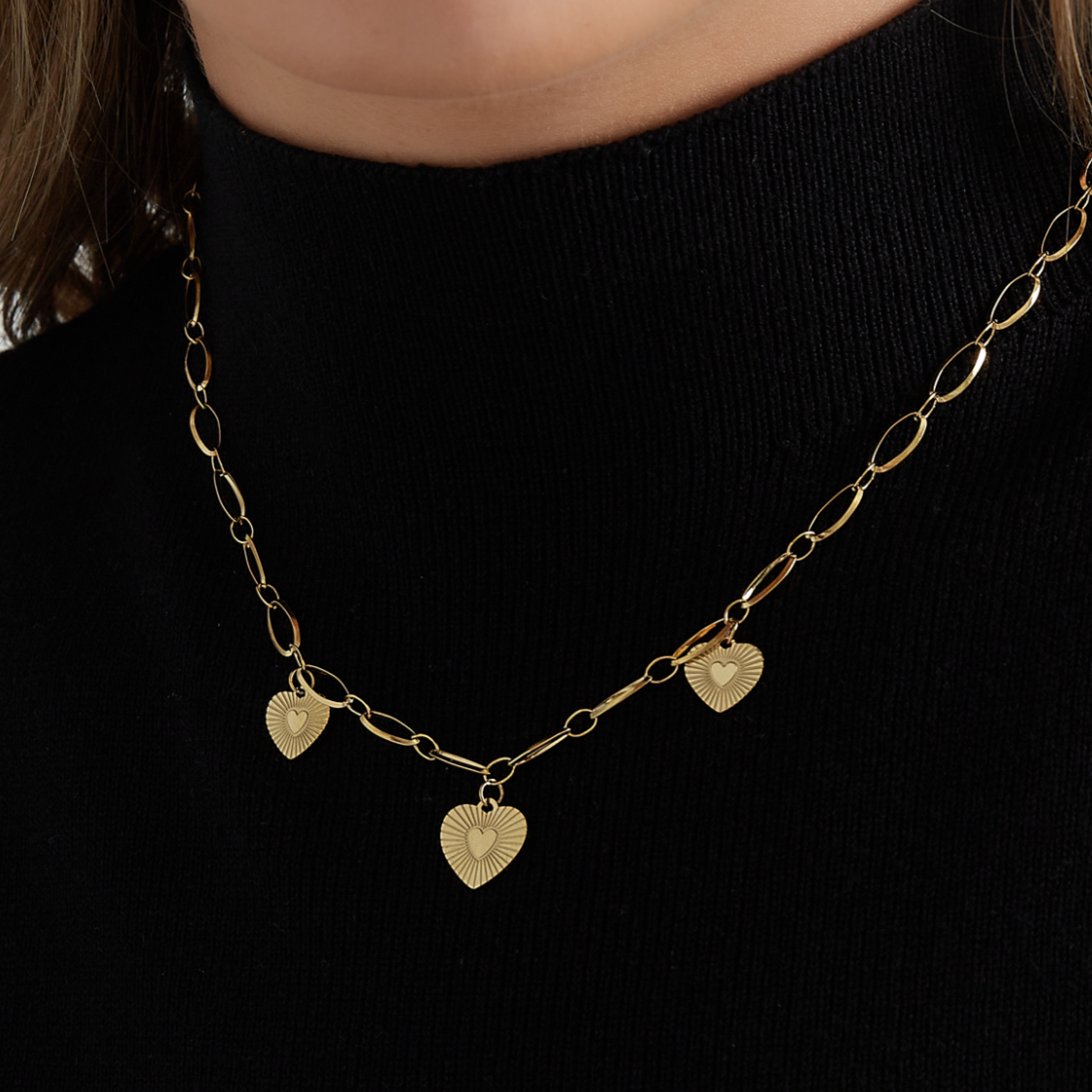 Ketting met 3 hartjes muntjes | Goudkleurig