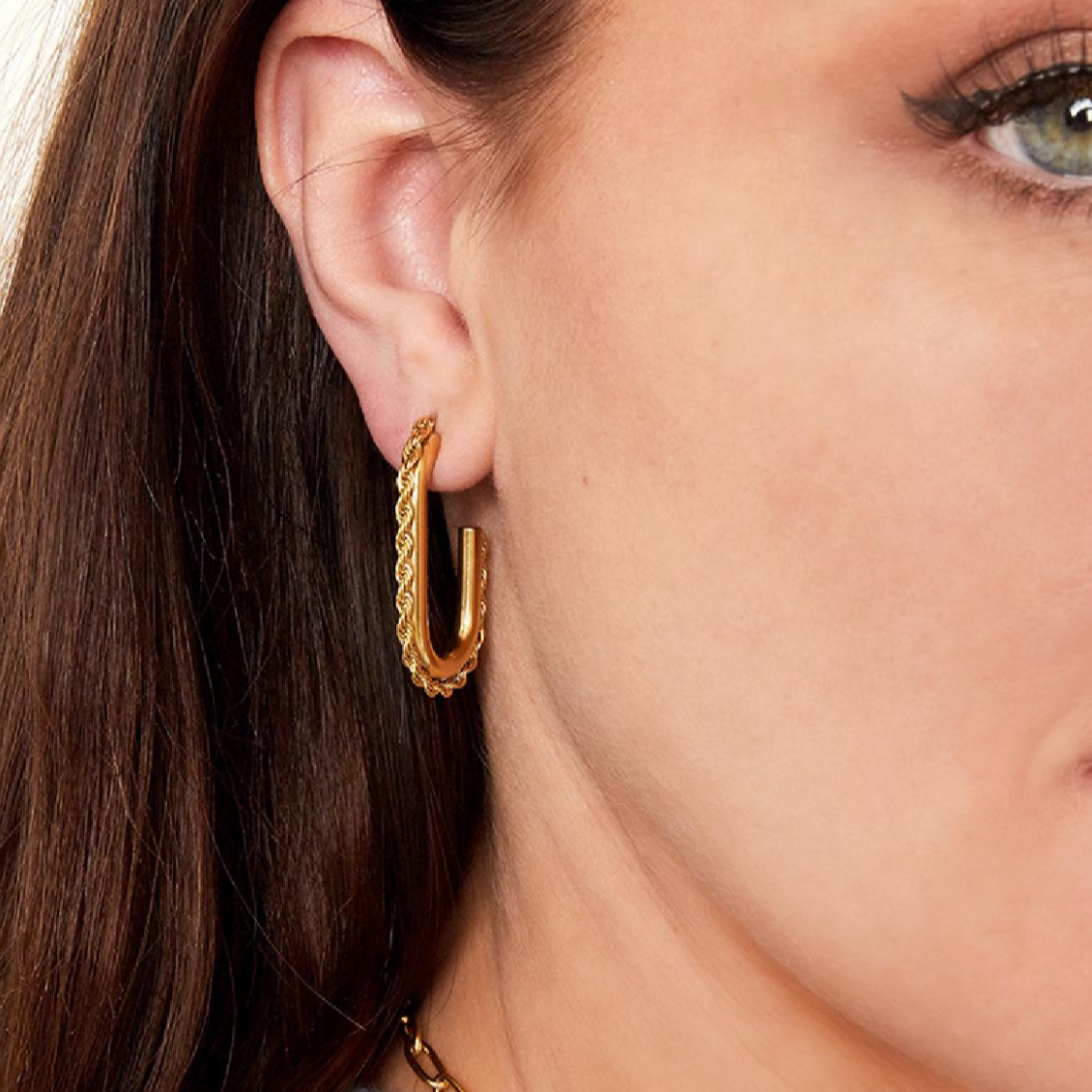 Ovale statement oorbellen met gedraaid detail | Goudkleurig