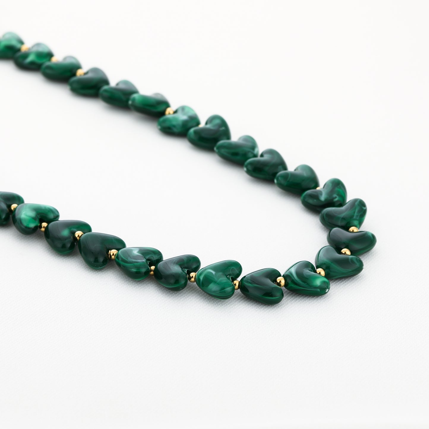 Kralenketting in hartjesvorm | Goud & Donkergroen