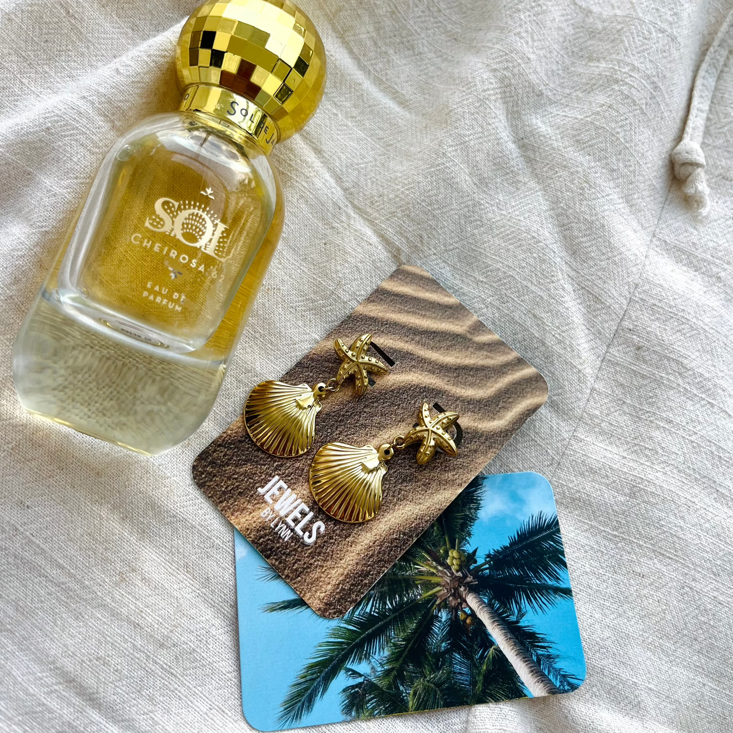 Oorbellen met zeester en schelpje | Goudkleurig