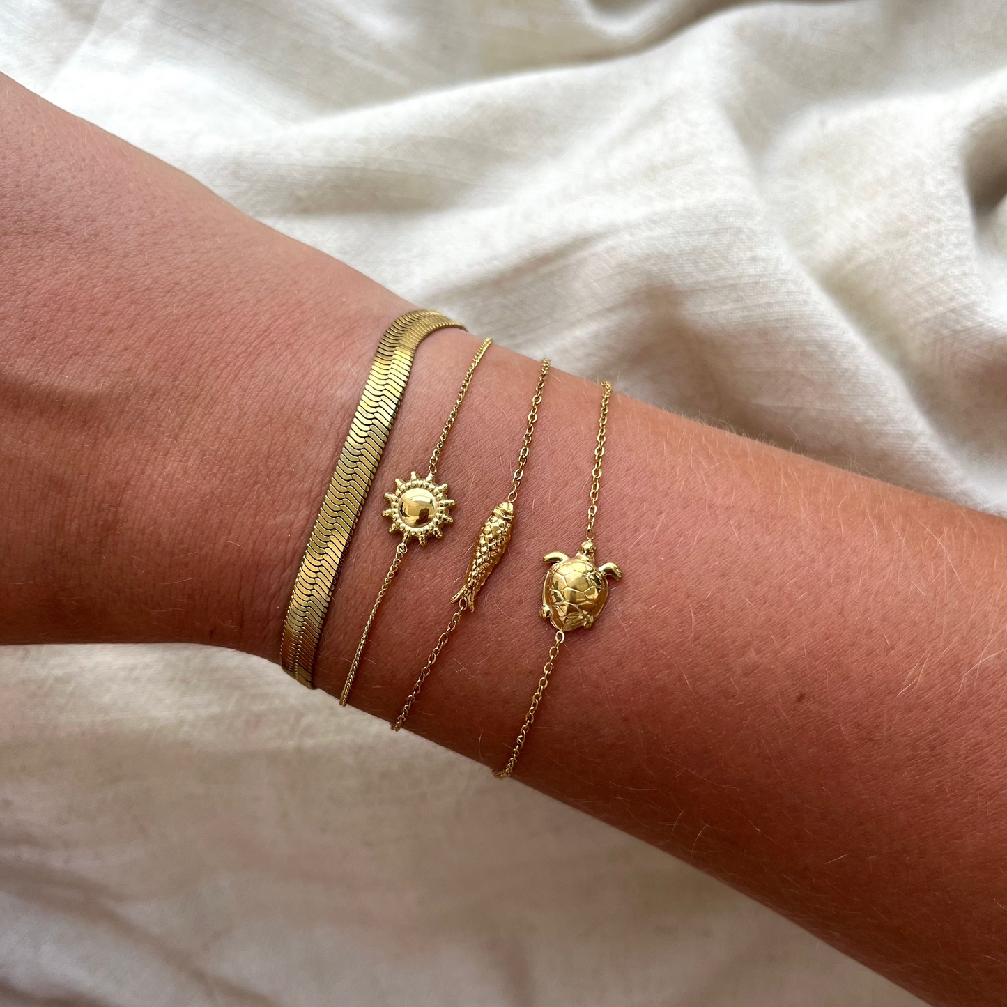Armband met zonnetje | Goudkleurig