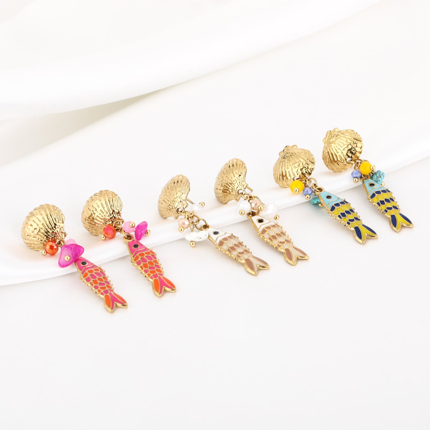 Oorbellen met roze & oranje visje | Goudkleurig