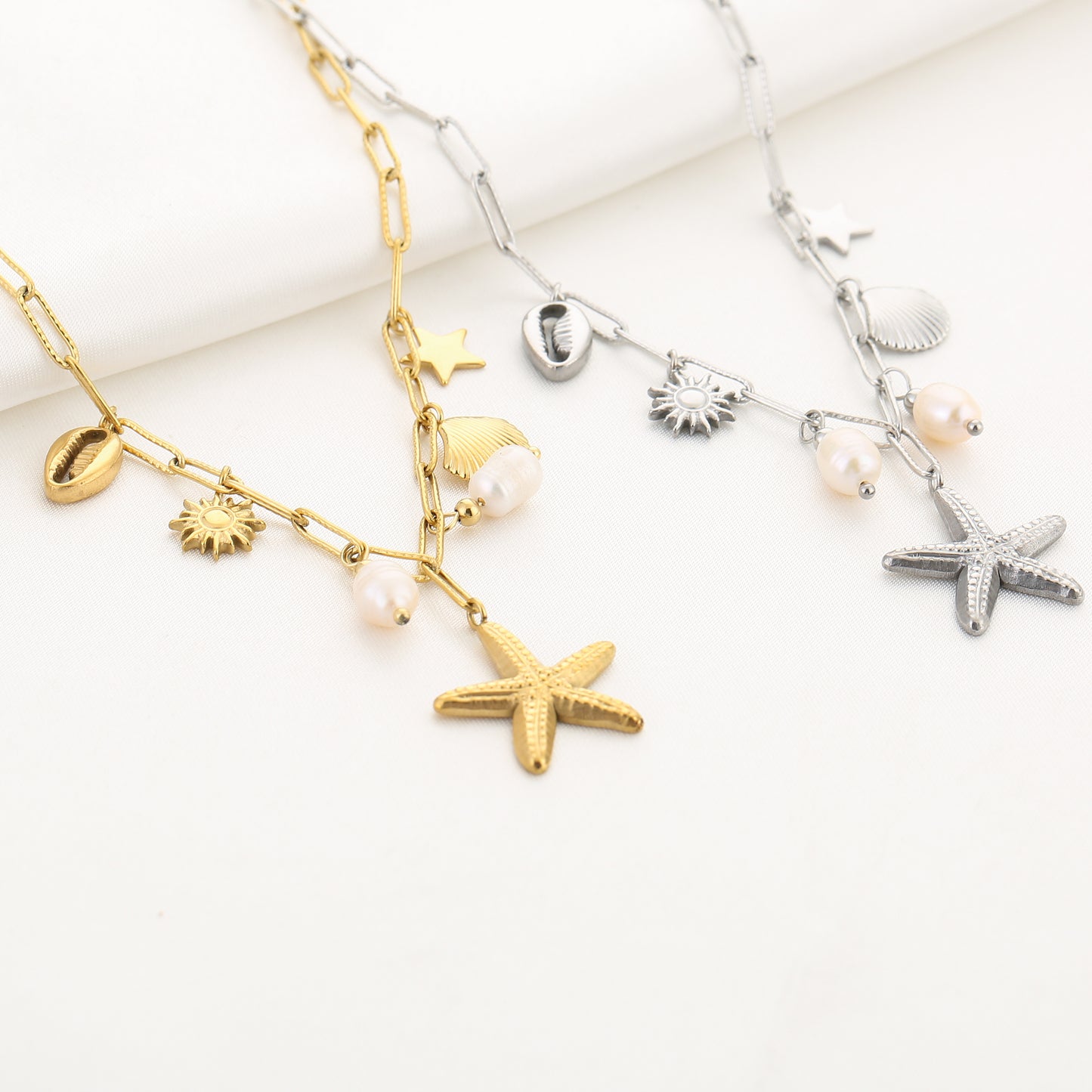 Bedelketting met zeester en schelpen bedels | Zilverkleurig