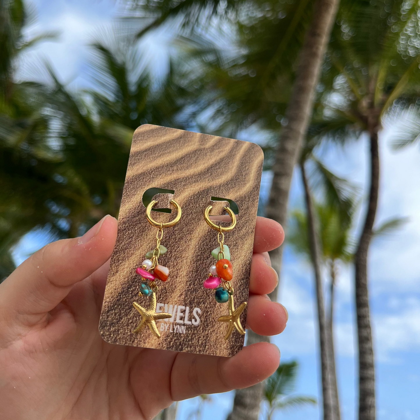 Oorbellen met zeester en gekleurde kraaltjes | Goudkleurig