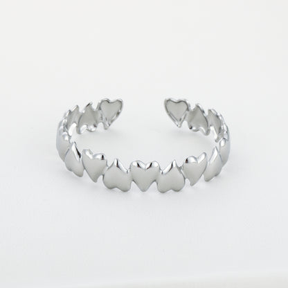 Bangle armband met hartjes | Zilverkleurig