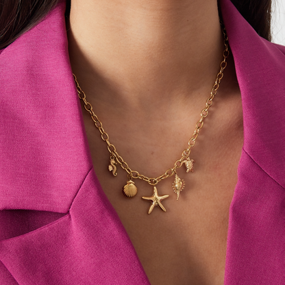 Bedelketting met zeedieren en schelpjes | Goudkleurig