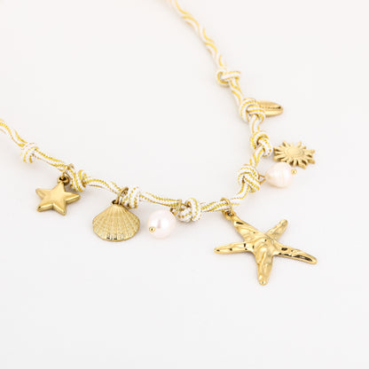 Bedelketting met leuke zee bedels | Goudkleurig