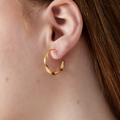 Clip oorbellen gedraaide hoops medium | Goudkleurig