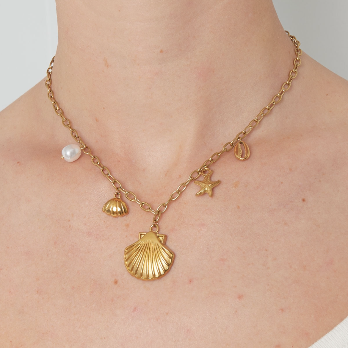 Bedelketting met schelpjes en zeester | Zilverkleurig