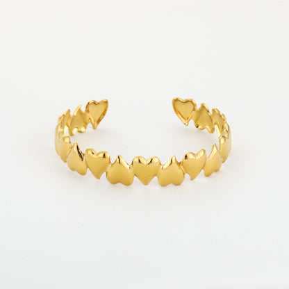 Bangle armband met hartjes | Goudkleurig
