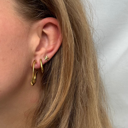 Clip oorbellen gedraaide hoops | Goudkleurig