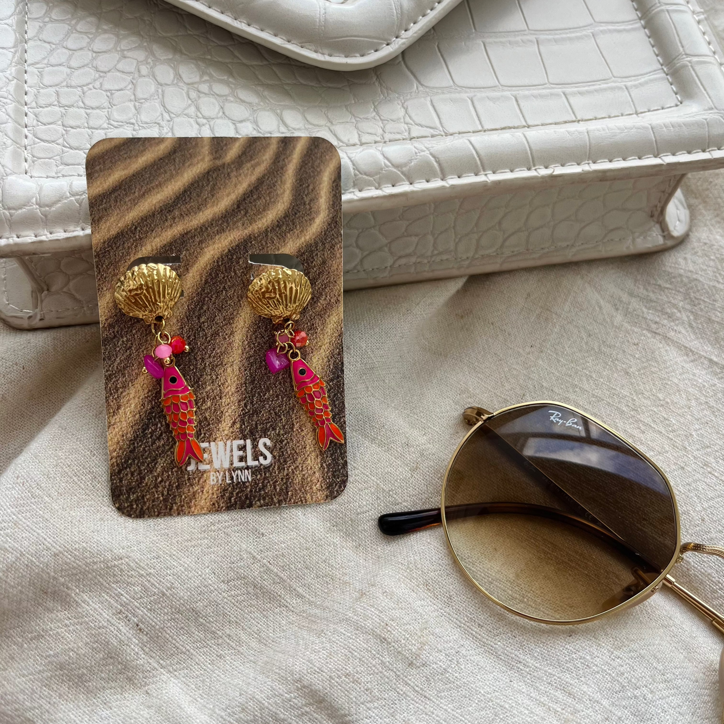 Oorbellen met roze & oranje visje | Goudkleurig